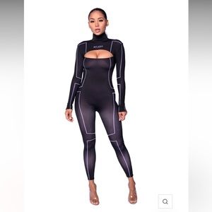 One piece black and white jumpsuit. Tried on but never worn.